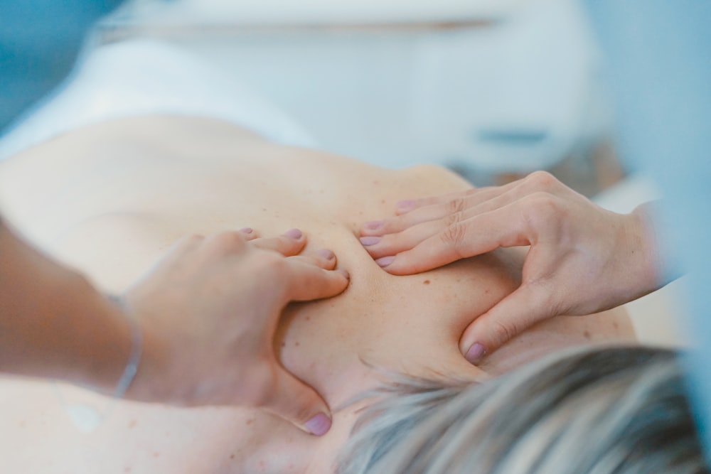 Therapist giving a relaxing shoulder massage